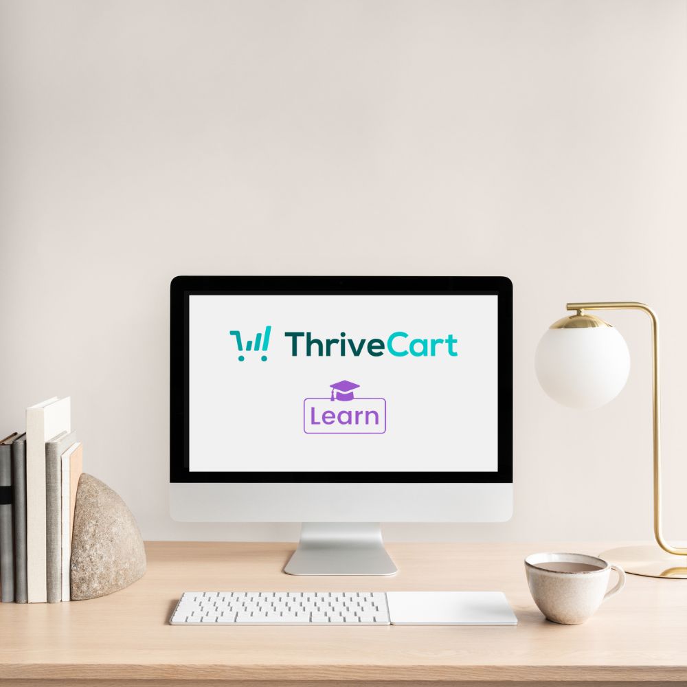 Thrivecart Learn logo on a desktop computer screen.